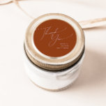 Whimsical Desert | Rust Thank You Wedding Favor Classic Round Sticker<br><div class="desc">This whimsical desert | rust thank you wedding favor is perfect for your simple rustic western beige and terracotta earth tones wedding. The neutral earthy boho color palette is vintage southwestern with a modern retro feel. The script is a delicate minimalist handwritten calligraphy that is quite elegant and romantic. The...</div>