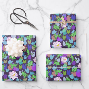 Whimsical green frogs and lily pads on dark blue wrapping paper sheets