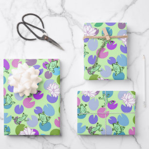 Whimsical green frogs and lily pads on mint green wrapping paper sheets