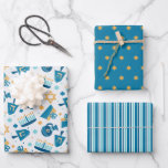 Whimsical Happy Hannukah Coodinating Wrapping Paper Sheets<br><div class="desc">Wrap your Hannukah gifts with style and whimsy with this adorable and customizable set of coordinating Chanukah themed gift wrap papers. Menorahs, Dreidels, Gifts and more dance happily across this cute pattern ... it's as bright and cheerful as the holiday itself. Everyone on your gift list is sure to be...</div>