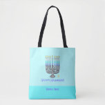 Whimsical Menorah "Happy Hanukkah" Customizable To Tote Bag<br><div class="desc">This Whimsical Menorah "Happy Hanukkah" Customizable Tote Bag features a fun illustration of a candle-laden menorah on light blue background with the words "Happy Hanukkah!" The durable polyester fabric bag comes in two convenient sizes — 16"x16" medium, and 18"x18" large, both lined, with black 28" cotton woven web straps. It's...</div>