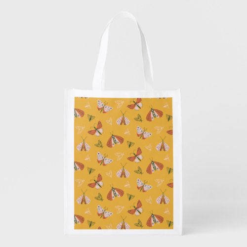 Whimsical Orange Ecru Moths Pattern Grocery Bag
