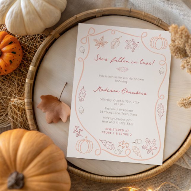 Whimsical Orange Red Fall In Love Bridal Shower Invitation (Fall leaves doodles wedding shower invitation in soft red orange autumn colors with handwritten font)
