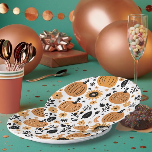 Whimsical pumpkin and fall floral pattern paper plates