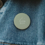 Whimsical Sage Green Gender Reveal Team Boy Button<br><div class="desc">Introducing our whimsical sage green gender reveal team boy button, perfect for your simple modern boho celebration any season of the year! This button has a boho-chic, gender-neutral vibe with elegant calligraphy and a delicate minimalist design, making it ideal for both girls and boys. Plus, it's editable, so you can...</div>