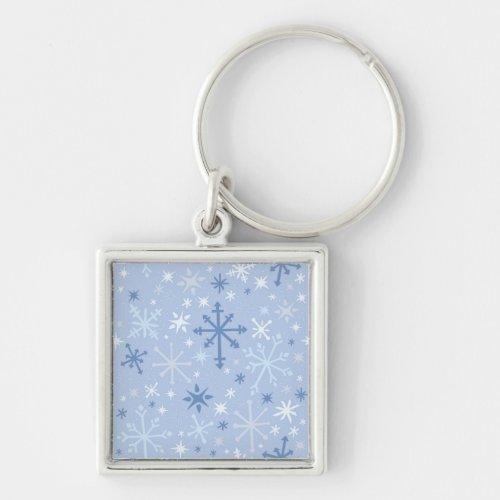 Whimsical snowflake flurry in icy blues keychain