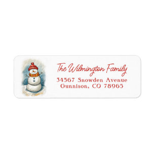 Whimsical Snowman in Orange Knit Cap and Scarf Label