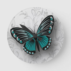 Whimsical Teal Butterfly on Gray Floral Round Clock
