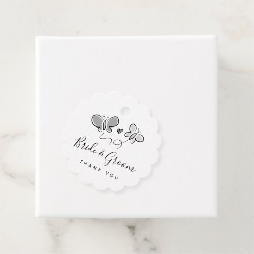 Whimsical wedding favor tags with romantic drawing
