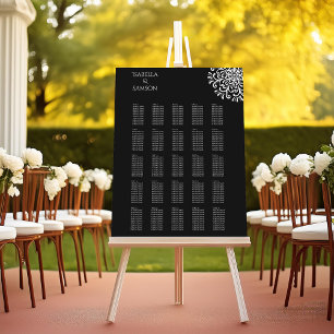 Whimsical White on Black Flourish seating chart