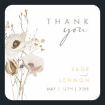 Whimsical Wildflower Thank You Wedding sticker<br><div class="desc">This Whimsical Wildflower thank you wedding sticker is perfect for your simple, elegant boho wedding. The minimalist watercolor wildflowers will help bring your vision to life! The design of pretty white and gold flowers, with touches of purple and yellow, is sure to complete your minimal fall floral wedding dream! Keep...</div>