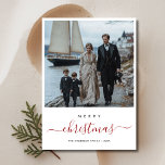 Whimsy Script Christmas Nautical Beach Photo Holiday Card<br><div class="desc">Imagine a Christmas card that feels like a day at the beach! With cute sailboats, a lighthouse, and soft ocean colors, this card is perfect for families who love the sea. It has a simple, elegant style, with a playful design that makes you feel warm and happy, just like a...</div>