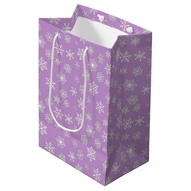 White 3-d snowflakes on a lavender background medium gift bag (Front Angled)