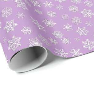 White 3-d snowflakes on a lilac background wrapping paper