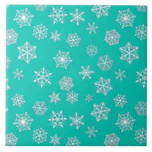 White 3-d snowflakes on a turquoise background tile