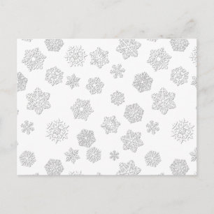 White 3-d snowflakes on a white background postcard