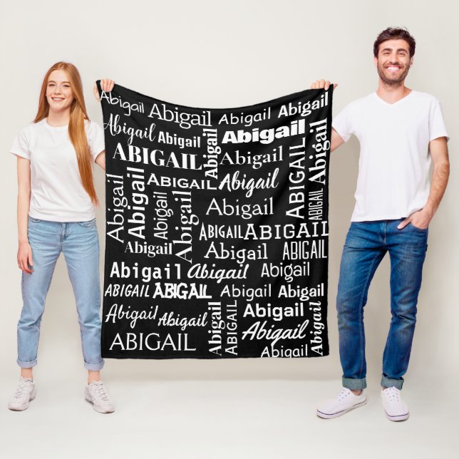 White ABIGAIL Name On Black Fleece Blanket (In Situ)