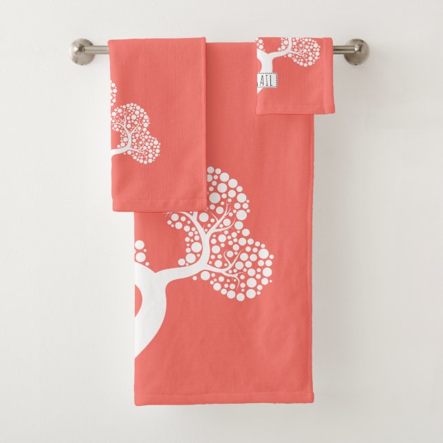 White abstract circle tree and name living coral bath towel set (Insitu)
