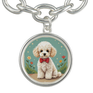 White adorable poodle with bow tie bracelet