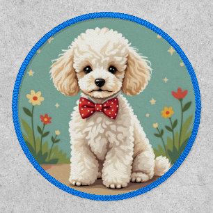 White adorable poodle with bow tie patch