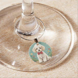 White adorable poodle with bow tie wine charm