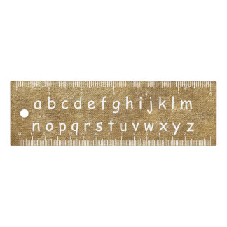 White Alphabet Letters on Gold Blends Rulers