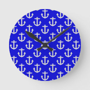 White Anchors On Blue Background Round Clock