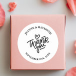 White and Black Custom Thank You Wedding Favor Classic Round Sticker<br><div class="desc">Elevate your wedding with our "White and Black Custom Thank You Wedding Favor Classic Round Sticker." Featuring a timeless black and white design with customizable text, these stickers are perfect for expressing gratitude. Ideal for sealing envelopes, decorating favors, or personalizing gifts, they add a touch of elegance to any wedding...</div>