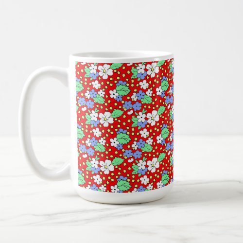 White and blue flowers on red coffee mug