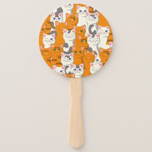 White and ginger cats pattern green eyes blue eyes hand fan