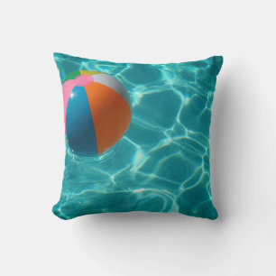 White and multicolored beach ball throw pillow