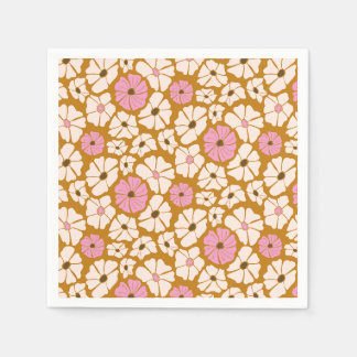 White and pink floral pattern on caramel brown napkins