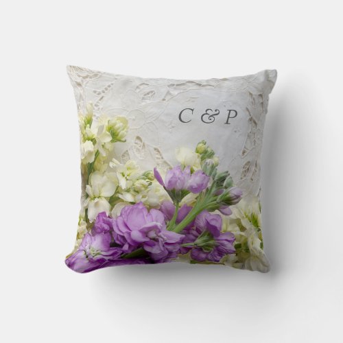 White and purple flowers on old lace throw pillow