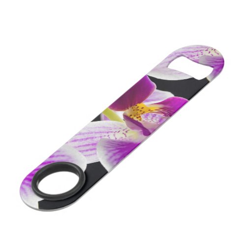 White and purple orchid bar key