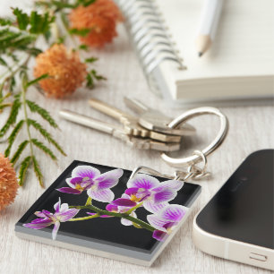White and purple orchid keychain