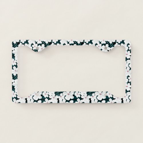 White and red flowers on green leaves license plate frame