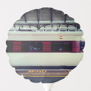 White and red train balloon