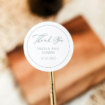 White and Sage Green | Italian Elegance Wedding Classic Round Sticker<br><div class="desc">These simple and elegant,  white and sage green wedding favor stickers feature classic,  old-world style with romantic calligraphy that says "thank you". Set the tone for your luxe,  sophisticated Italy inspired wedding with this classy,  minimalist design.</div>