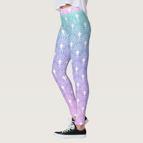 White art deco pattern on blue and purple gradient leggings