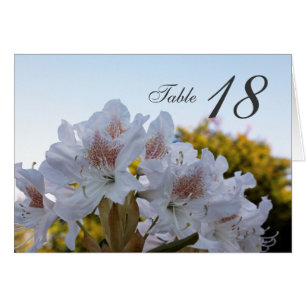 white azalea flowers dinner table number card