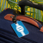 White band and oval shield with monogram on blue luggage tag<br><div class="desc">A luggage tag in blue with your monogram on a white oval shield with a band. 
For safety reasons,  never put your full address visible on a luggage label. That is why you find on the backside places for your name,  phone number,  and email address only.</div>