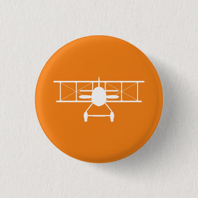 White Biplane Profile on Orange Background Button (Front)