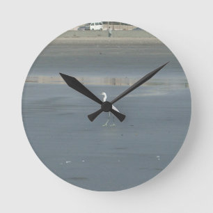 White Bird on Gray Sand Beach Art Print Round Clock