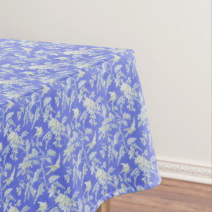 White Birds and Flowers on Blue Tablecloth