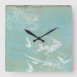 White Birds Flying Through Blue Sky Square Wall Clock