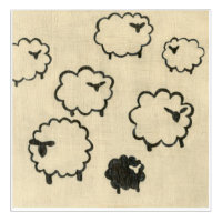 White & Black Sheep on Cream Background