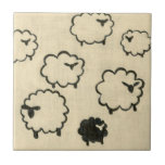White & Black Sheep on Cream Background Ceramic Tile<br><div class="desc">Is your child having trouble sleeping? Have them count the white and black sheep in this print by Chariklia Zarris. A wonderful piece that is elegant in its simplicity. Order your print today!</div>