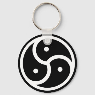 white black triskellion keychain