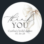 White Bow Favors Bridal Shower Thank You  Classic Round Sticker<br><div class="desc">Add a Romance with These Elegant White Bow Thank You Stickers. It’s the little things that make your celebration unforgettable — like these graceful white satin bow stickers that say “thank you” in the sweetest way. Perfect for bridal showers, baby showers, weddings, or any love-filled gathering, they bring a soft...</div>