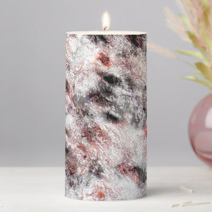 White bumpy spongy texture mix in black red stains pillar candle